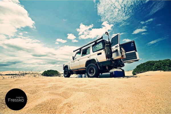 Ute on Australian beach on holiday 