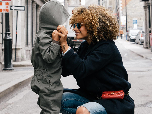 Mother with child outside